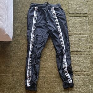 Adidas Black Track Pants with White Logo Stripes